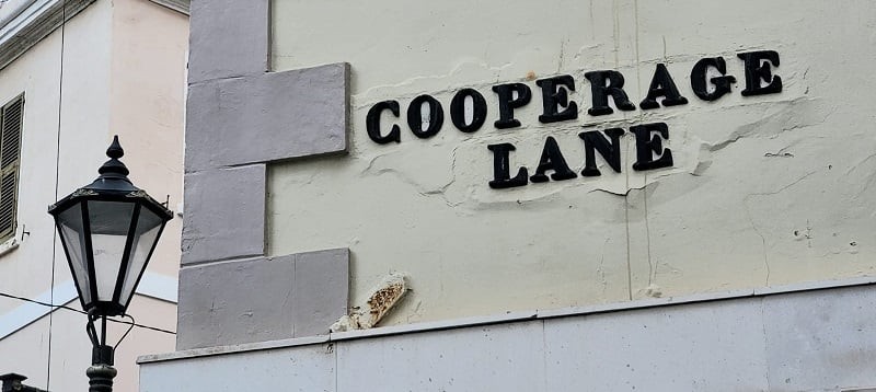 Old cast iron street sign at Cooperage Lane at its junction with Main Street (November 2020).